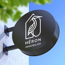 Enseigne Héron Immobilier